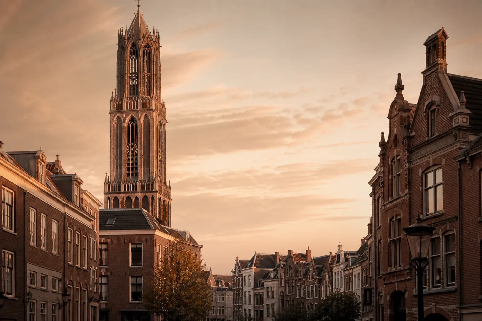 Utrecht Dom Tower and historic brick at golden hour